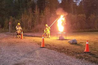 The North Frontenac Fire Department demonstrated how to extinguish a grease fire.